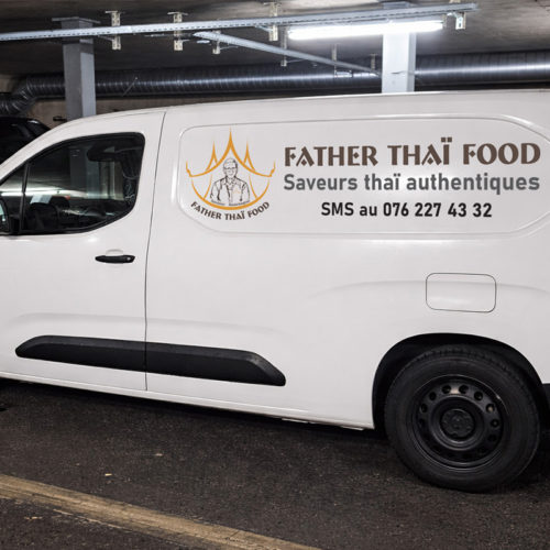 White cargo van in parking garage